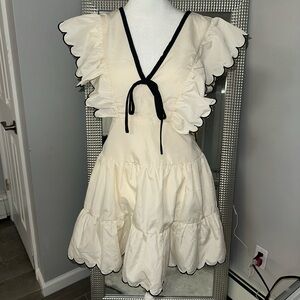 Cream Ruffle Dress with Black Trim